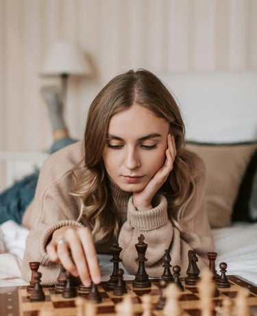 Teenage girl developing critical thinking skills through chess coaching at Shetty Chess Classes