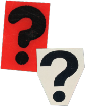 Vraagtekens uitgeknipt op rood en wit