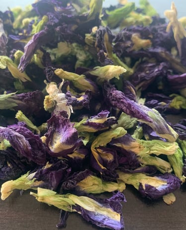 a pile of dried blue butterfly pea flower petals