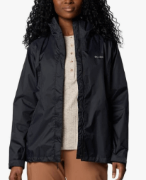 a woman in a black jacket and pants