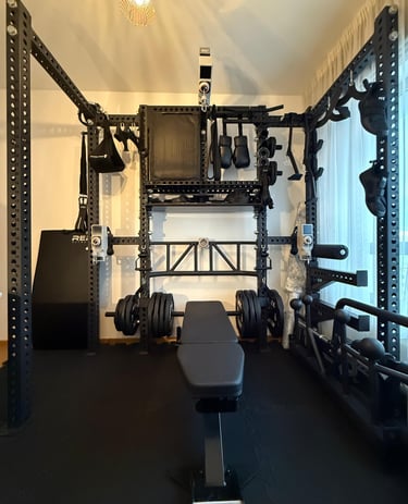 a homegym with a gym equipment set up- Mind Muscle Perfection 