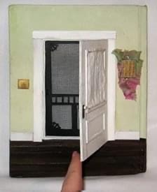 an altered book view inside of the door