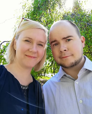 a man and woman standing next to each other