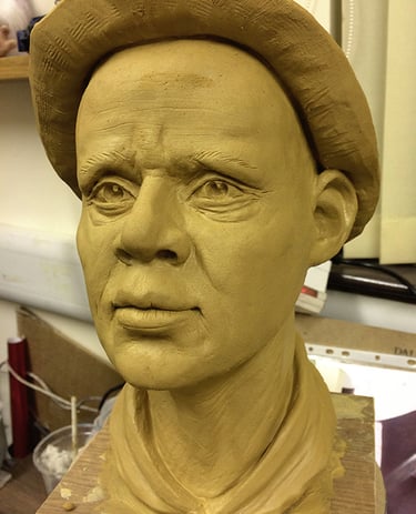 Realistic male portrait bust sculpted in clay for bespoke 3D sculptural services
