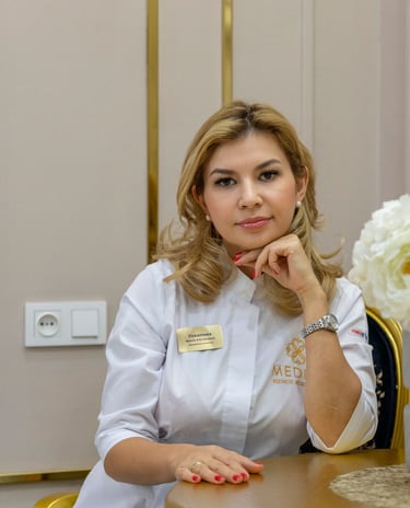 a woman in a white shirt and a vase with flowers