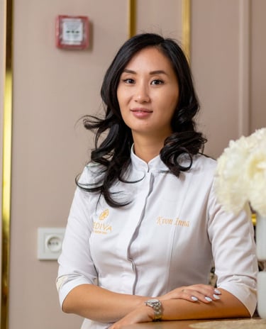 a woman in a white shirt and a vase with flowers
