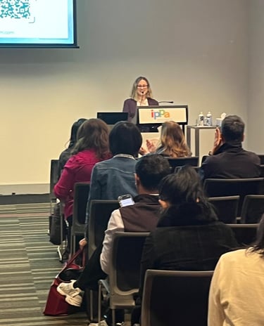 Julie Gachet Mitrovic presenting at a conference – speaker and coach