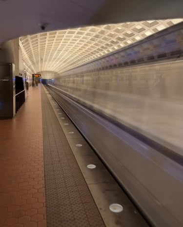 Washington metro subway station with a train leaving the station