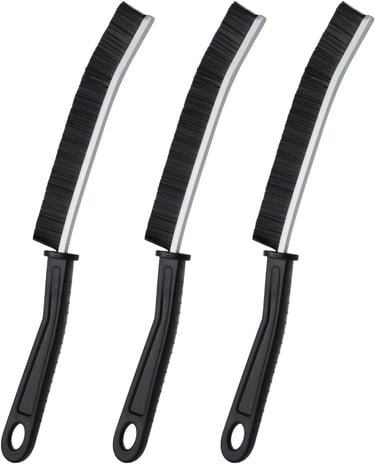 three black and white knives and a knife on a white background