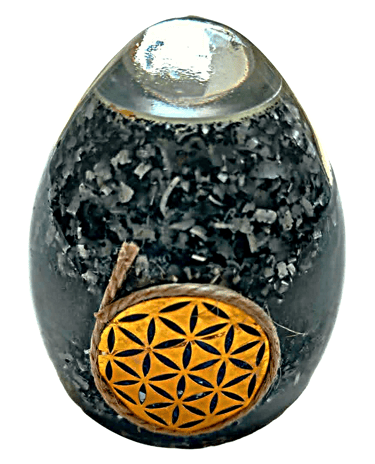 Shungite orgone energy egg with golden flower of life symbol for EMF protection and healing.