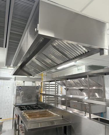 Commercial kitchen ventilation and exhaust hood system installation designed for heat, smoke