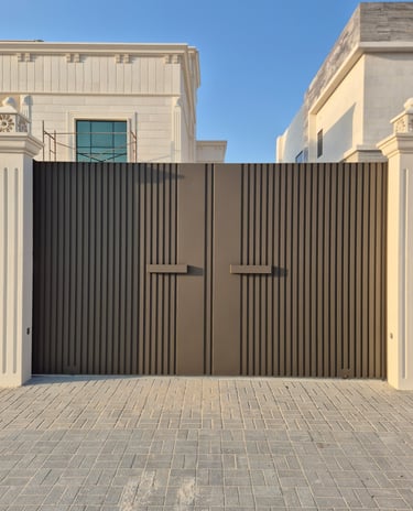 Custom cast aluminum gate fabrication and installation for luxury villa in Dubai.