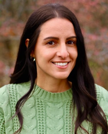 Lisa, the founder of Mother's Milk, smiling warmly, embodying compassionate lactation support.