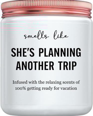 Candle that says it smells like she's planning another trip