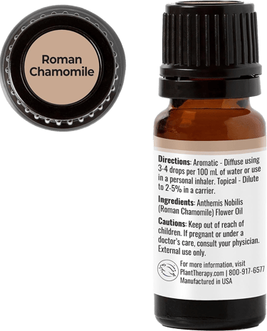 Roman Chamomile oil bottle with usage directions, cautions, and labeled cap.