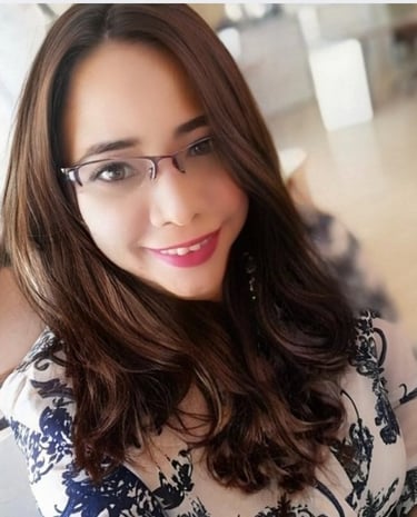 Professional psychologist smiling for a photo in formal wear