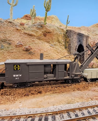 Maintenance of Way for Santa Fe Railroad.  A steam driven crane and work train caboose.