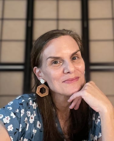 writer creator Amy A. DeCew office candid headshot