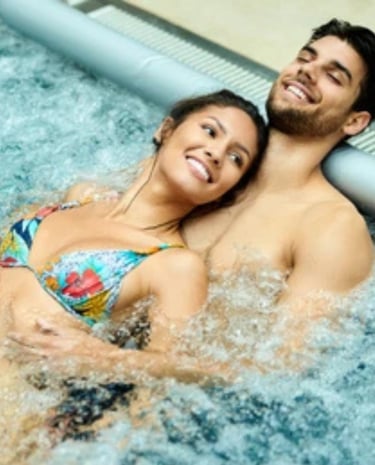 a man and woman in a hot tub