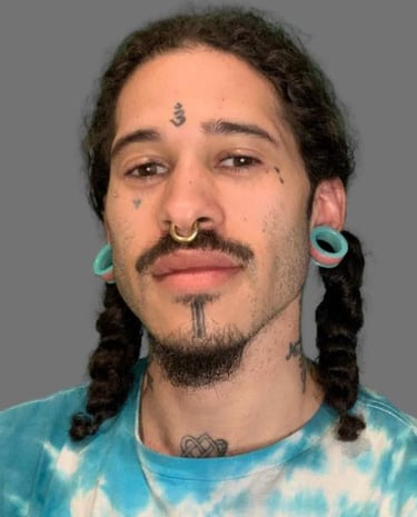 a man with a mustache and a mustache with a mustache on his face DOyen Fraser Jr.