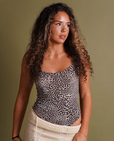 A model in a leopard print top
