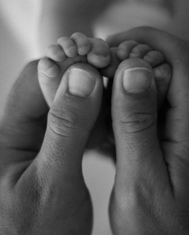 newborn toes in dads hands - natural newborn photography adelaide hills