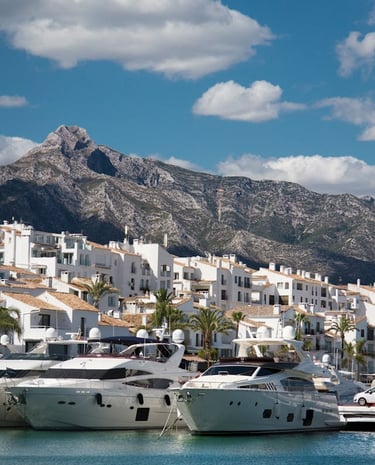 View of Puerto Banus, the iconic marina in Marbella with La Concha mountain in the background