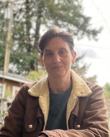 shown is Talcott Broadhead. who is white with short, dark hair & green eyes.