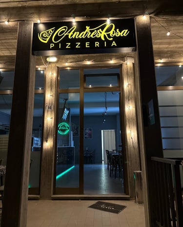 Ingresso di AndrèsRosa Pizzeria ad Alseno, specializzata in pizza artigianale e contemporanea