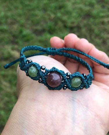 web constructions green bracelet