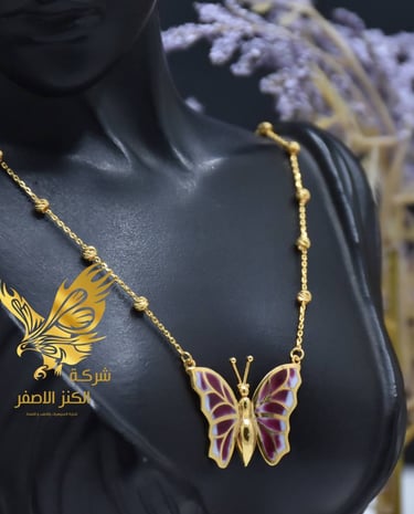 a woman's torso and torso with a butterfly pendant |  | Alkanz Alasifar | Antalya Jewellery