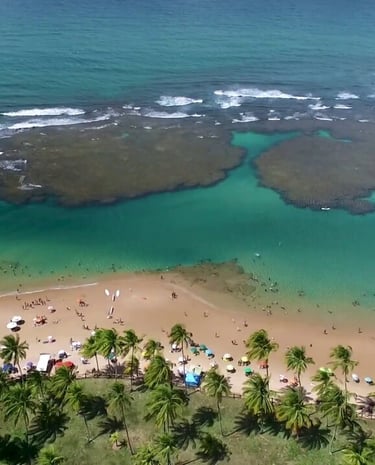a beach with a view of a beach and a sandy beach