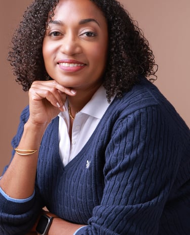 Beverly Vanterpool in a blue sweater and a white shirt