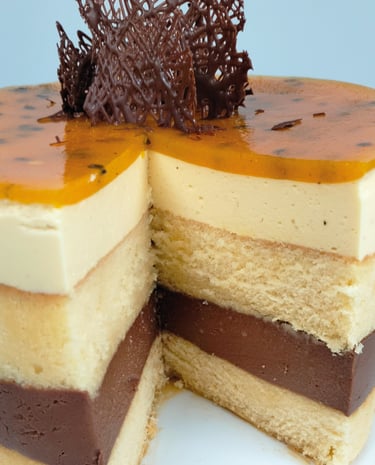 a cake with a chocolate layer of cake and chocolate frosting