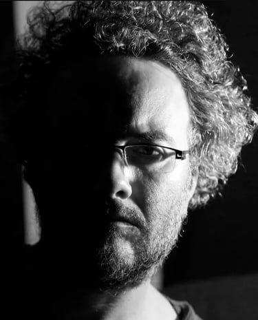 Portrait of film instructor Tan Tolga Demirci