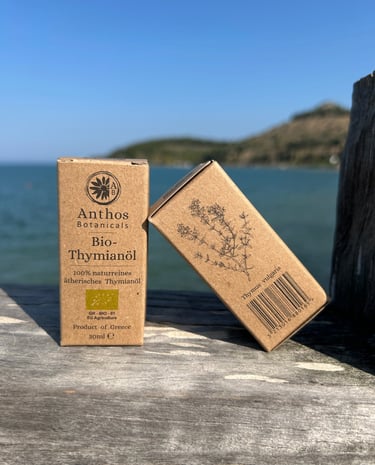 two boxes of organic thyme essential oils