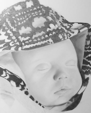a baby wearing a hat and a hat