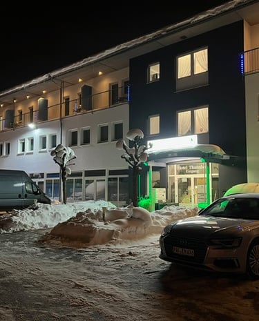 a car parked in front of Hotel Thannhof with Parking place from Hotel Thannhof entry