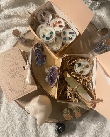 a box of candles and candles on a table