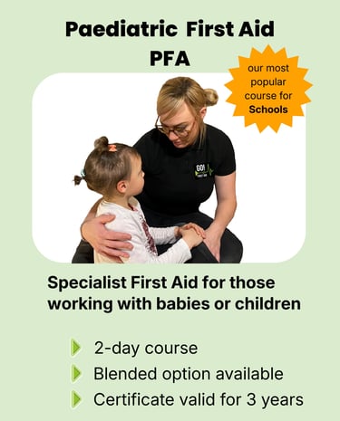 First Aider comforting a child representing Paediatric First Aid care 