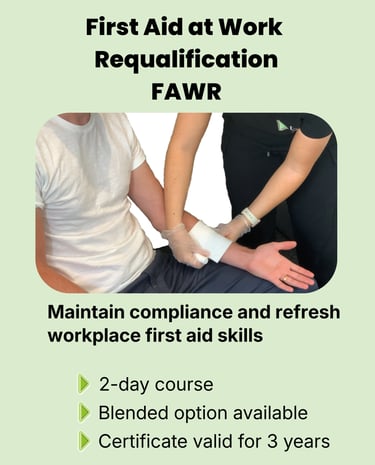 First Aider demonstrating wound dressing for First Aid at Work Requalification course