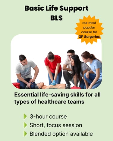 A group huddled together learning CPR on a Basic Life Support (BLS) course