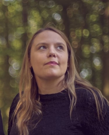 a man and woman standing next to each other
