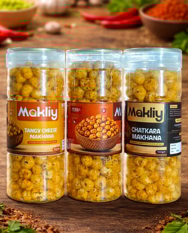 Makliy brand Tangy Cheese and Chatkara flavored roasted makhana fox nuts in transparent plastic jars.