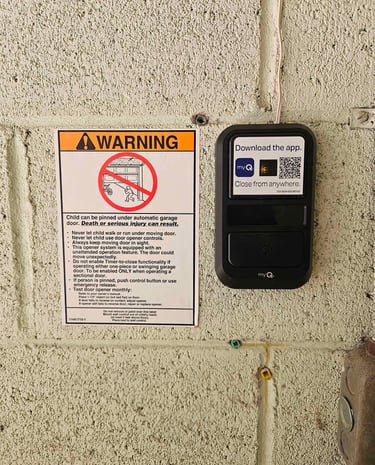 MyQ pad installed with warning sticker.