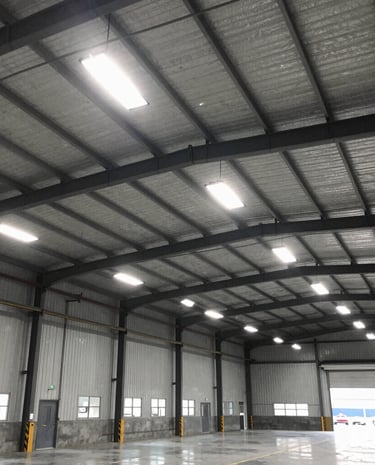 Close-up of an electrician testing electrical panels with professional tools.