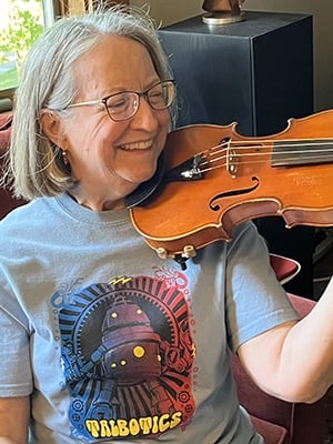 Talbotics t-shirt wearer playing violin in Massachusetts.