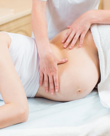a woman is getting a massage at a massager