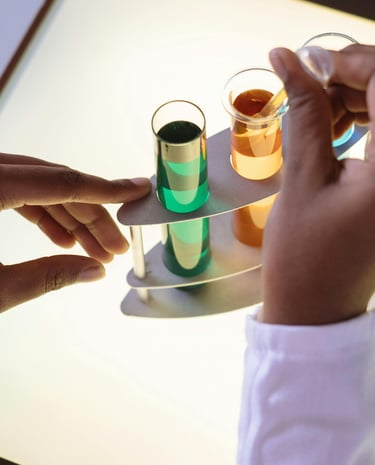 a person holding a tray with a tray of liquid