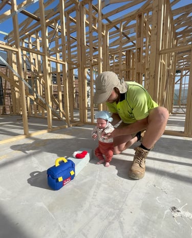 Dylan with Rory visiting dad at work